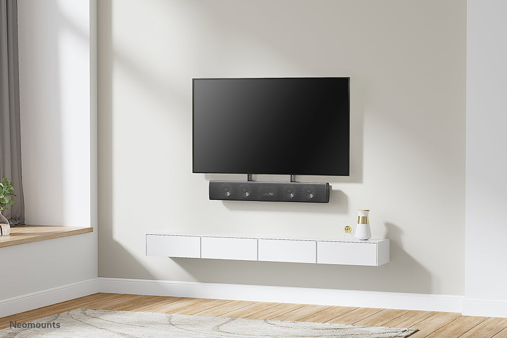 Neomounts AWL29-750BL1 univerzális videobar/soundbar/hangszóró tartó, mélységben állítható (0-4,2 cm) - Fekete