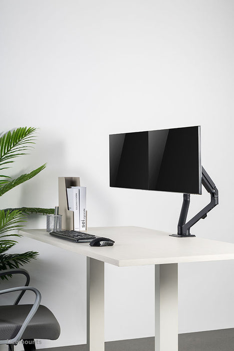 A Neomounts FPMA-D650D fekete egy full motion asztali tartó legfeljebb 27 hüvelykes (69 cm) képernyőkhöz.
