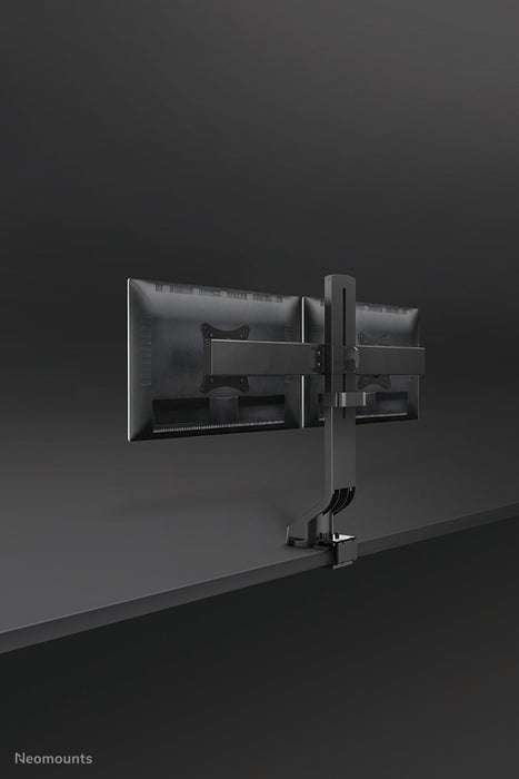 A Neomounts FPMA-D860D fekete egy asztali tartó két legfeljebb 27 hüvelykes (69 cm) lapos képernyőhöz.
