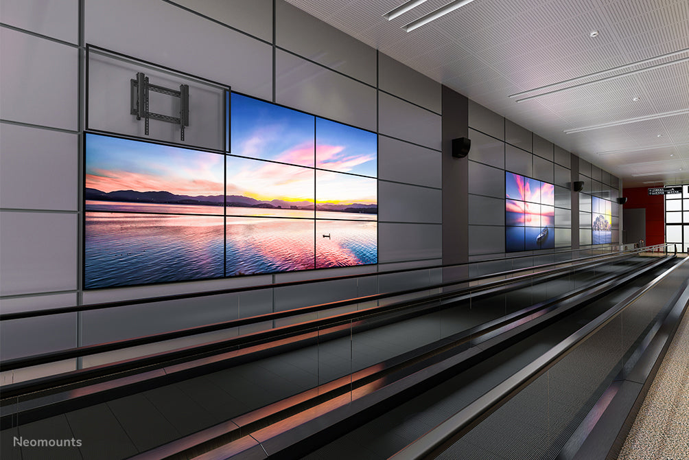 A Neomounts LED-VW2500 fekete egy sík video wall fali tartó akár 75 hüvelykes (191 cm) képernyőkhöz, vízszintes és függőleges szereléshez - Fekete