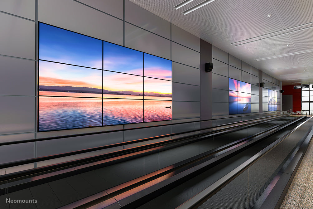A Neomounts LED-VW2500 fekete egy sík video wall fali tartó akár 75 hüvelykes (191 cm) képernyőkhöz, vízszintes és függőleges szereléshez - Fekete