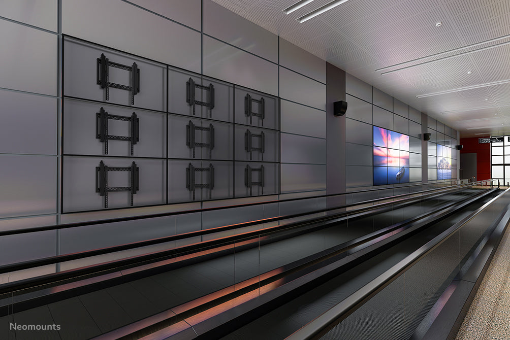 A Neomounts LED-VW2500 fekete egy sík video wall fali tartó akár 75 hüvelykes (191 cm) képernyőkhöz, vízszintes és függőleges szereléshez - Fekete