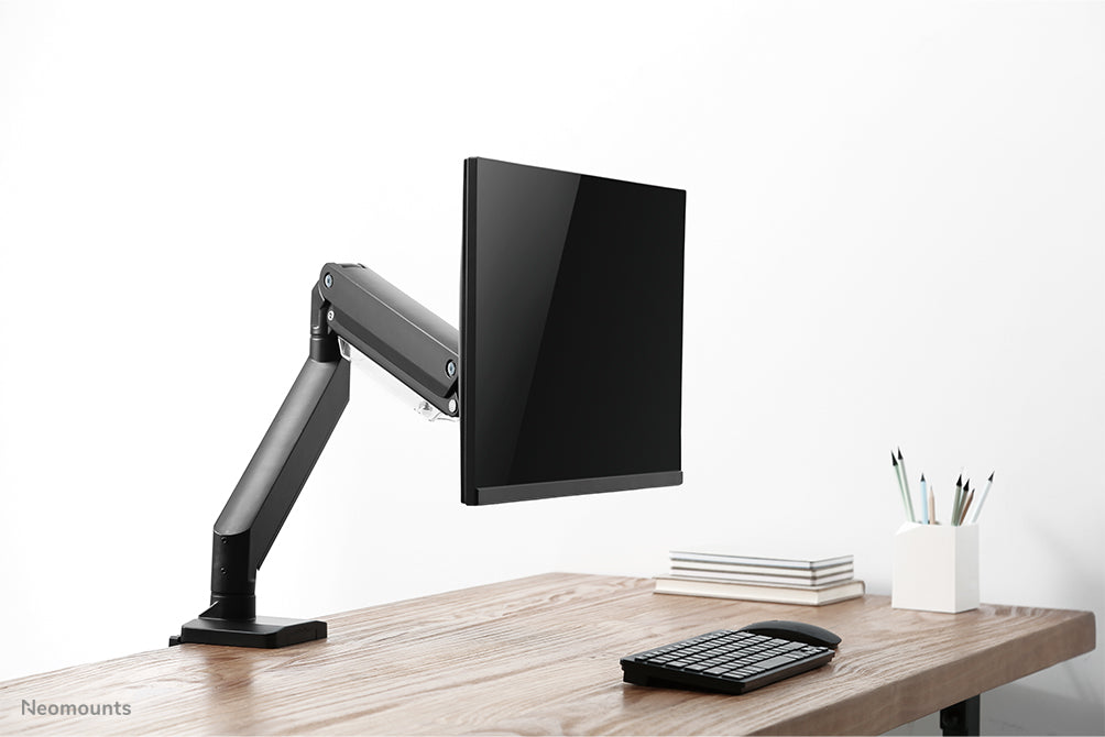 A Neomounts NM-D775 fekete egy gázrugós asztali tartó legfeljebb 32 hüvelykes (81 cm) lapos képernyőkhöz - Fekete