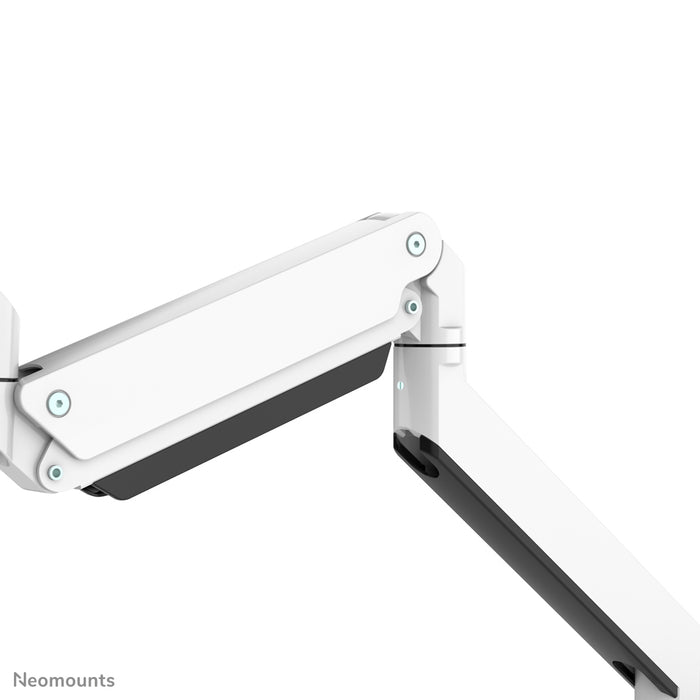 A Neomounts NM-D775DX3 fehér egy gázrugós asztali tartó keresztléc és kar segítségével legfeljebb 27 hüvelykes (68,6 cm) lapos képernyőkhöz.