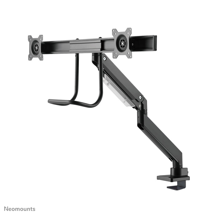 A Neomounts NM-D775DX fekete egy gázrugós asztali tartó keresztléc és kar segítségével legfeljebb 32 hüvelykes (81 cm) lapos képernyőkhöz.