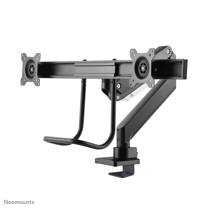 A Neomounts NM-D775DX fekete egy gázrugós asztali tartó keresztléc és kar segítségével legfeljebb 32 hüvelykes (81 cm) lapos képernyőkhöz.