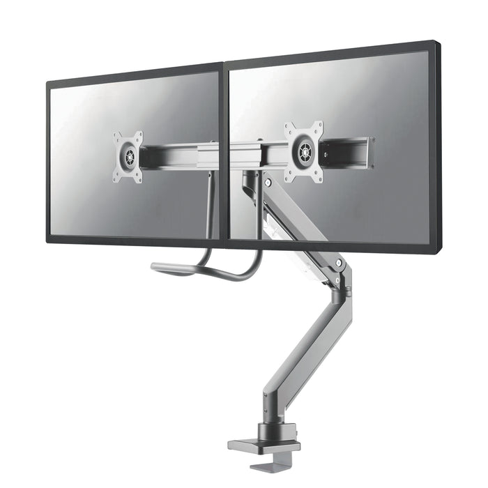 A Neomounts NM-D775DX ezüst egy gázrugós asztali tartó keresztléc és kar segítségével legfeljebb 32 hüvelykes (81 cm) lapos képernyőkhöz.