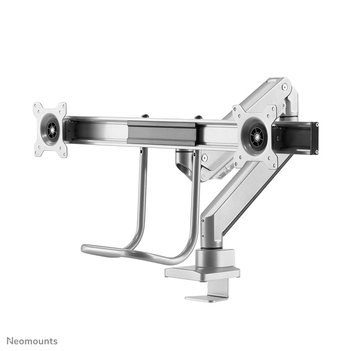 A Neomounts NM-D775DX ezüst egy gázrugós asztali tartó keresztléc és kar segítségével legfeljebb 32 hüvelykes (81 cm) lapos képernyőkhöz.