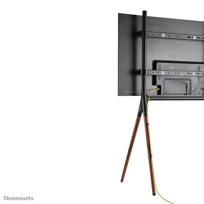A Neomounts NM-M1000 fekete bútor lapos képernyős TV-khez akár 70 hüvelykig (178 cm).